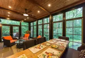 Porch Conversions create elegant, nature-inspired living spaces for year-round comfort.
