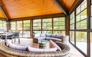 Porch Conversions seamlessly blend indoor comfort with breathtaking outdoor views.