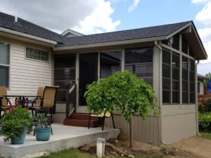 3-season vinyl sunroom featuring Sunspace WeatherMaster™ Model 200 with horizontal windows by Spectrum Remodeling.