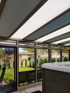 3-season vinyl sunroom featuring Sunspace WeatherMaster™ Model 200 with horizontal windows by Spectrum Remodeling.