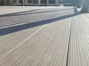 Close up of Water Shedding Decking with a textured surface, designed for durability and effective water drainage